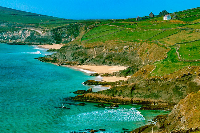 photograph of rugged coastal cliffs and a beach