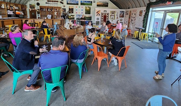 a group listening to a speaker