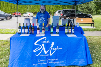 sunset meadow vineyard vendor table