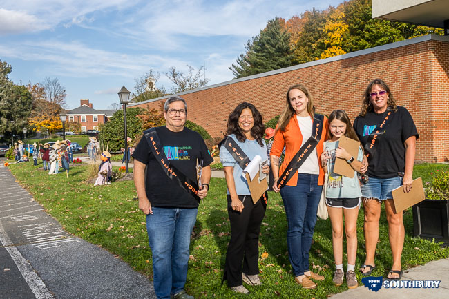 SACA judges in front of scarecrows